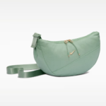 Nike AURA practical crescent-shaped crossbody bag for summer storage with zippered pockets and adjustable shoulder strap-Steam/Steam/Light Transparent Gold
